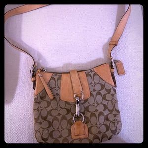 Coach crossbody or shoulder bag.